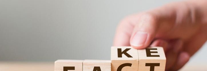 Four letter blocks being changed from the word "FAKE" to "FACT"